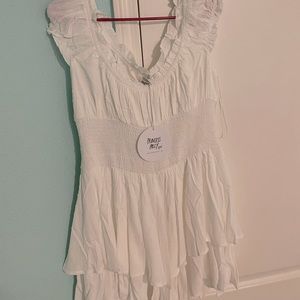White, flowy romper from Princess Polly